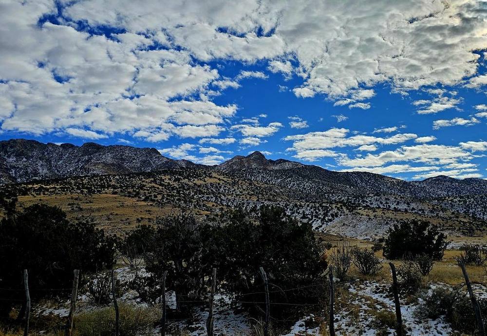 Broken cloud light over the high desert benches at midday